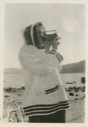Image of Miriam MacMillan taking movie pictures
